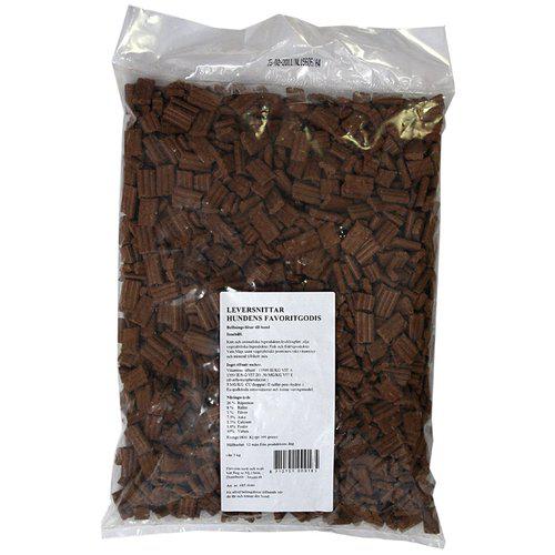 En pose Godbidder chokolade klodser på hvid baggrund.